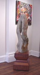 Lozenge Pedestal with Ikkyou sculpture on it.  Made of Oak and Purpleheart woods.  22"w x 16"d x 18"t.  $1,295