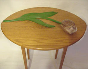 Tulip Table with carved oak leaves and Alabaster Bud.  Tabletop: 34" x 28".  $1,995.